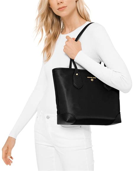 michael kors eva small top zip tote black|michael kors eva tote bag.